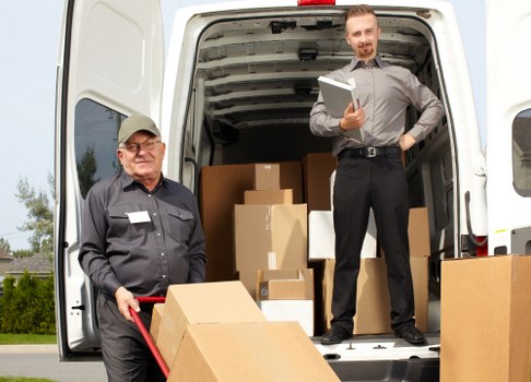 Removal team preparing a van with safety equipment in Richmond