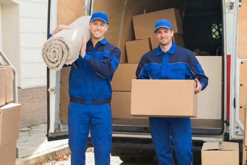 Professional removal services in Richmond with moving truck and packed boxes