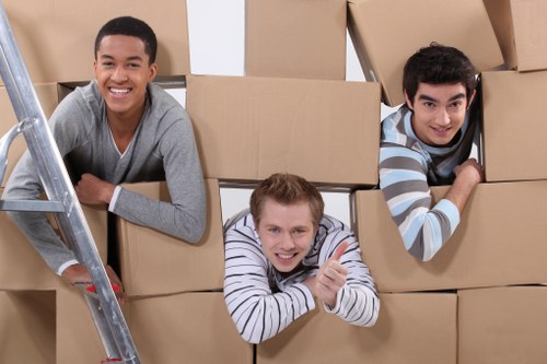 Business relocation team transporting office furniture