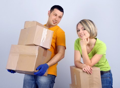 Boxes and furniture arranged for a student relocation in Richmond