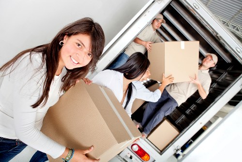 Professional removal van team planning access and parking in Richmond